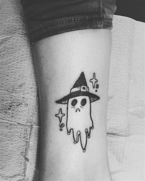 Ghost with witch hat tattoo